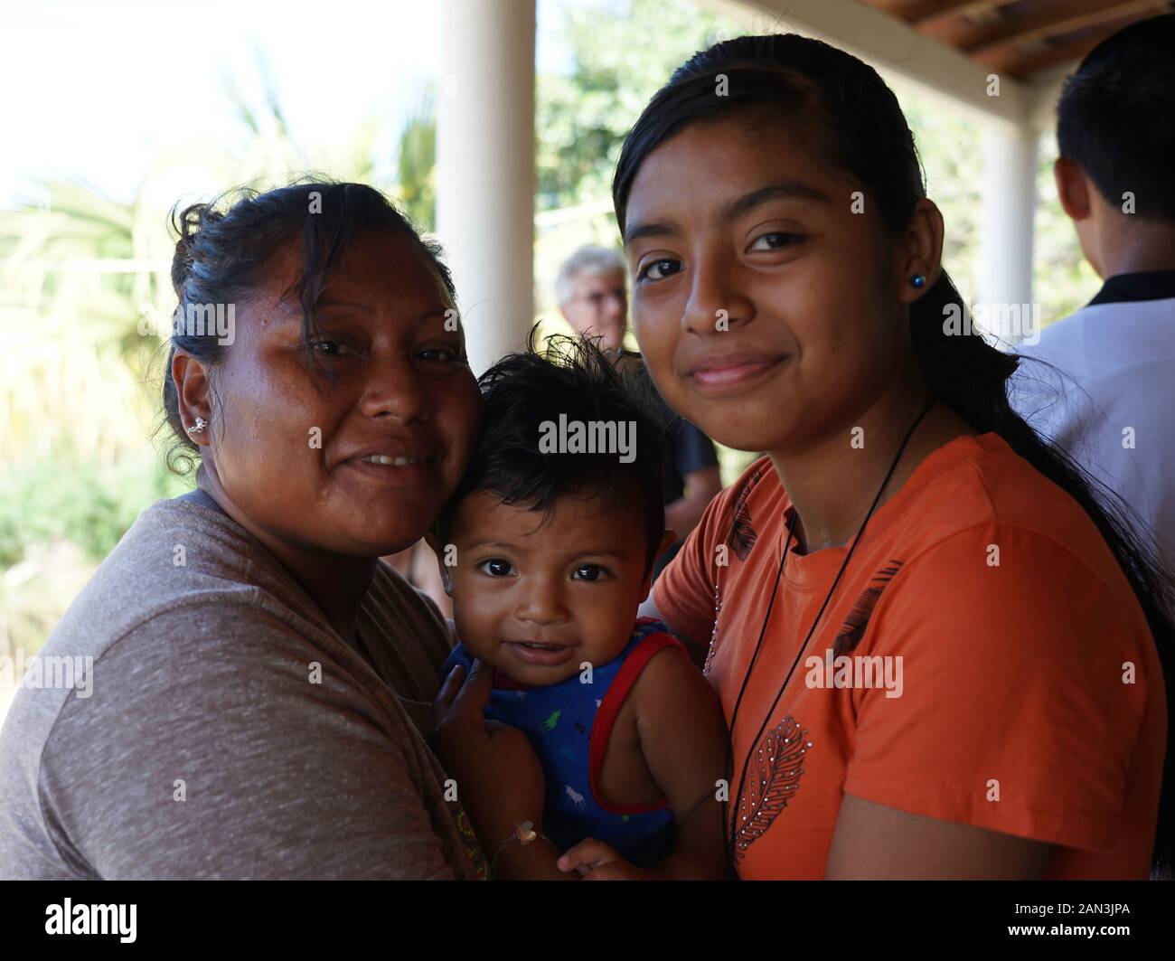 Mexican mother and kids happy in Mazunte, Huatulco, Mexico, Bahia de Huatulco, Stock Photo