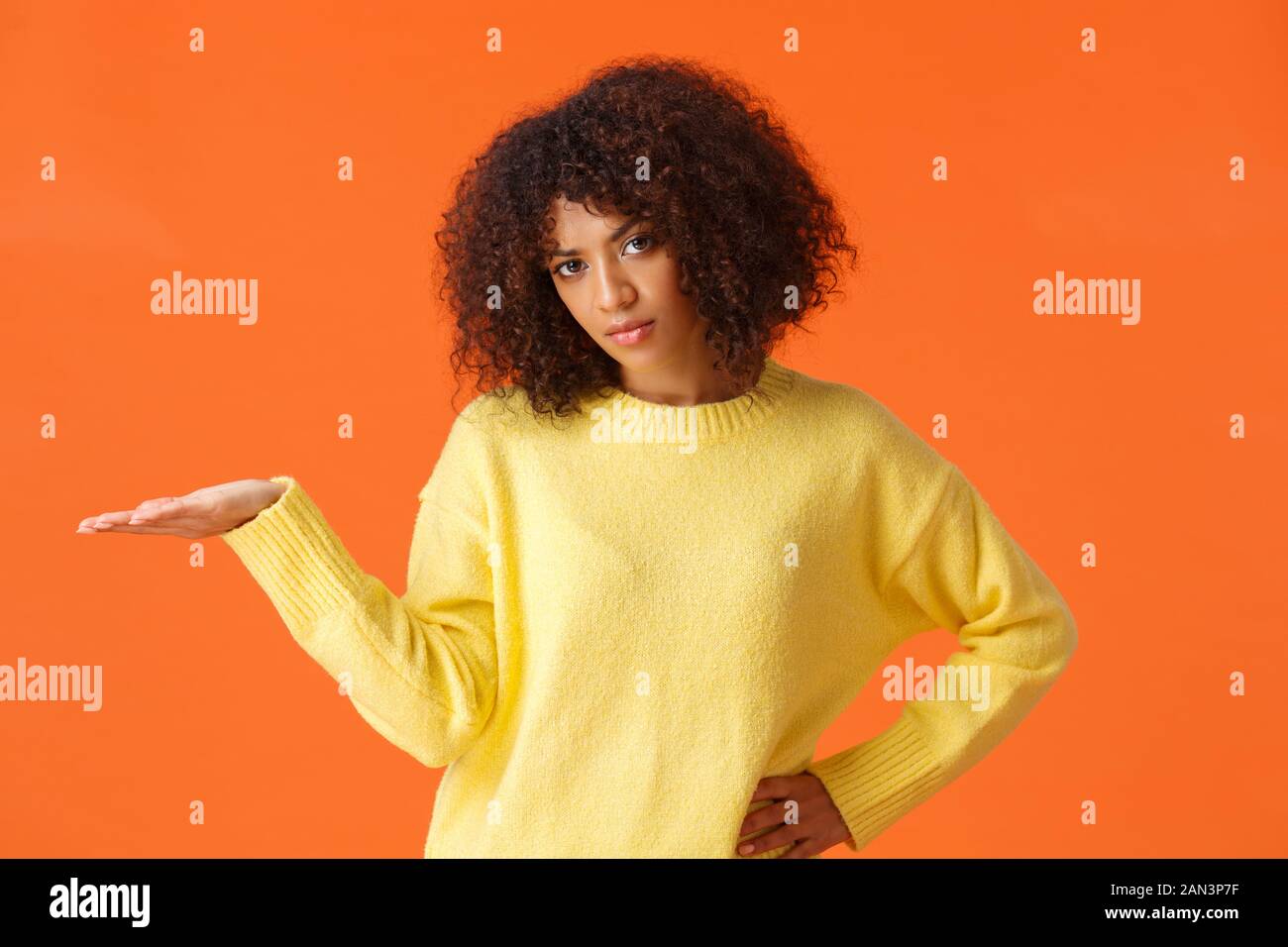 So What I Dont Care Unbothered And Careless Unimpressed Sulking African American Woman With Curly Hair Raise Hand In Dismay Displeased With Bad Stock Photo Alamy