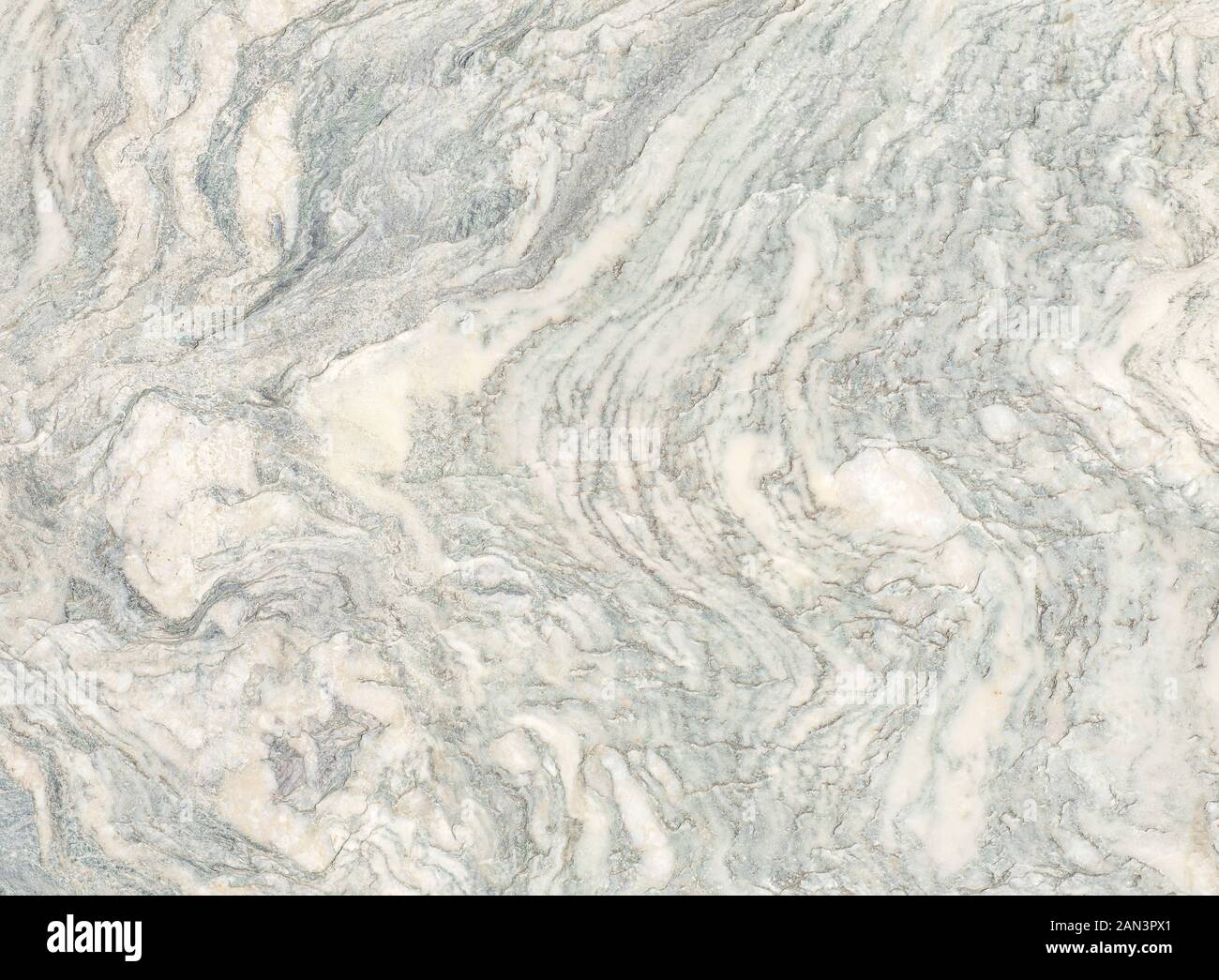 Beige limestone similar to marble natural surface for bathroom or kitchen countertop. High resolution texture and pattern. Stock Photo