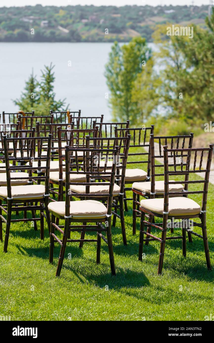 Rows of chairs for guests at an open-air wedding ceremony Stock Photo ...