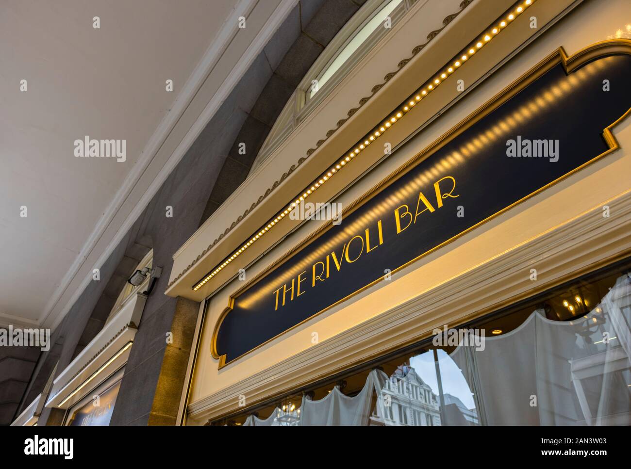 Name sign outside the Rivoli Bar, a popular up-market cocktail bar and lounge for drinks in the iconic Ritz Hotel, Piccadilly, London W1 Stock Photo