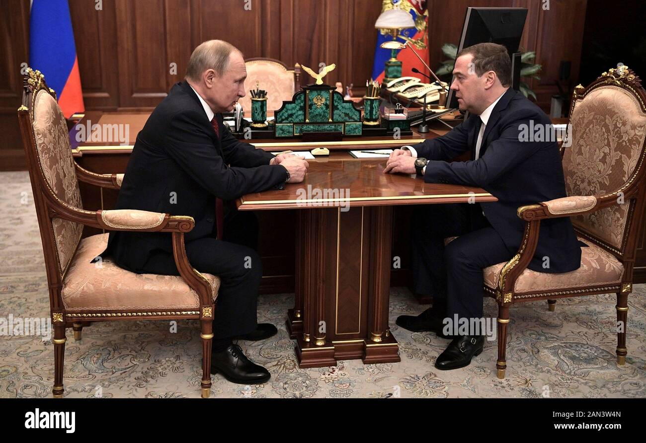 Moscow, Russia. 15 January, 2020. Russian President Vladimir Putin, left, during a one on one meeting with Prime Minister Dmitry Medvedev at the Kremlin January 15, 2020 in Moscow, Russia. Medvedev resigned amid sweeping constitutional changes proposed by Putin. Credit: Alexei Nikolsky/Kremlin Pool/Alamy Live News Stock Photo