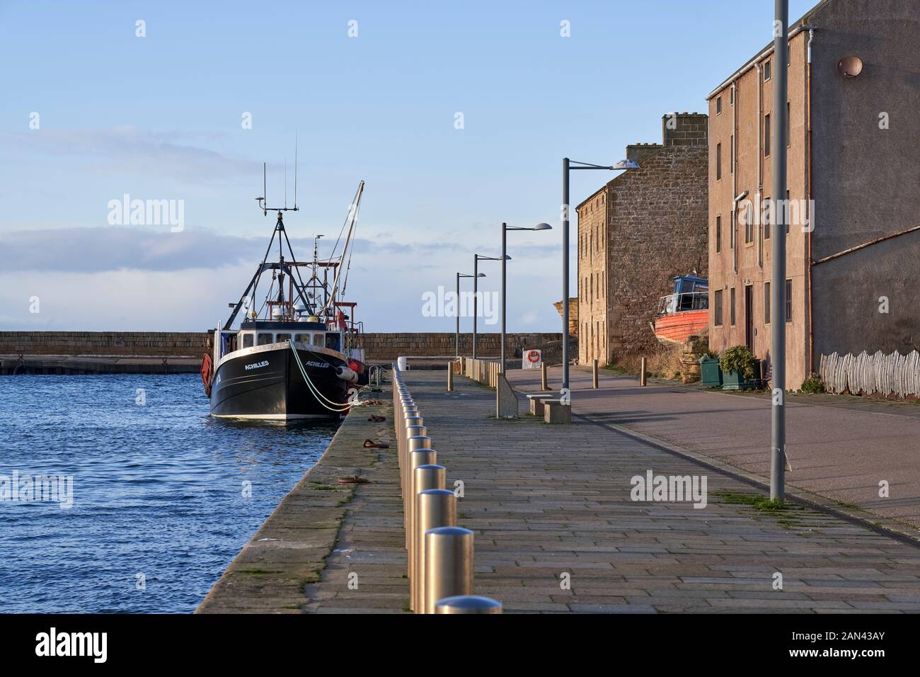 14 January 2020. Burghead Harbour, Moray, Scotland, UK. This is a scene from a very High Tide afternoon when most Fishing Boats were berthed due to st Stock Photo