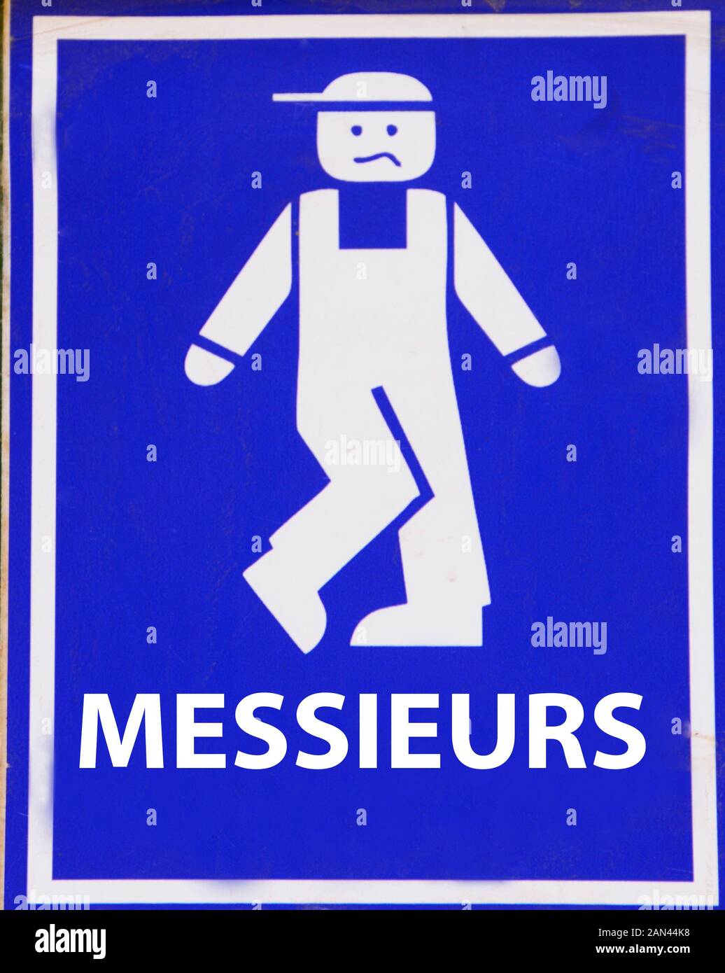 Funny GENTS TOILET sign in French. Stock Photo