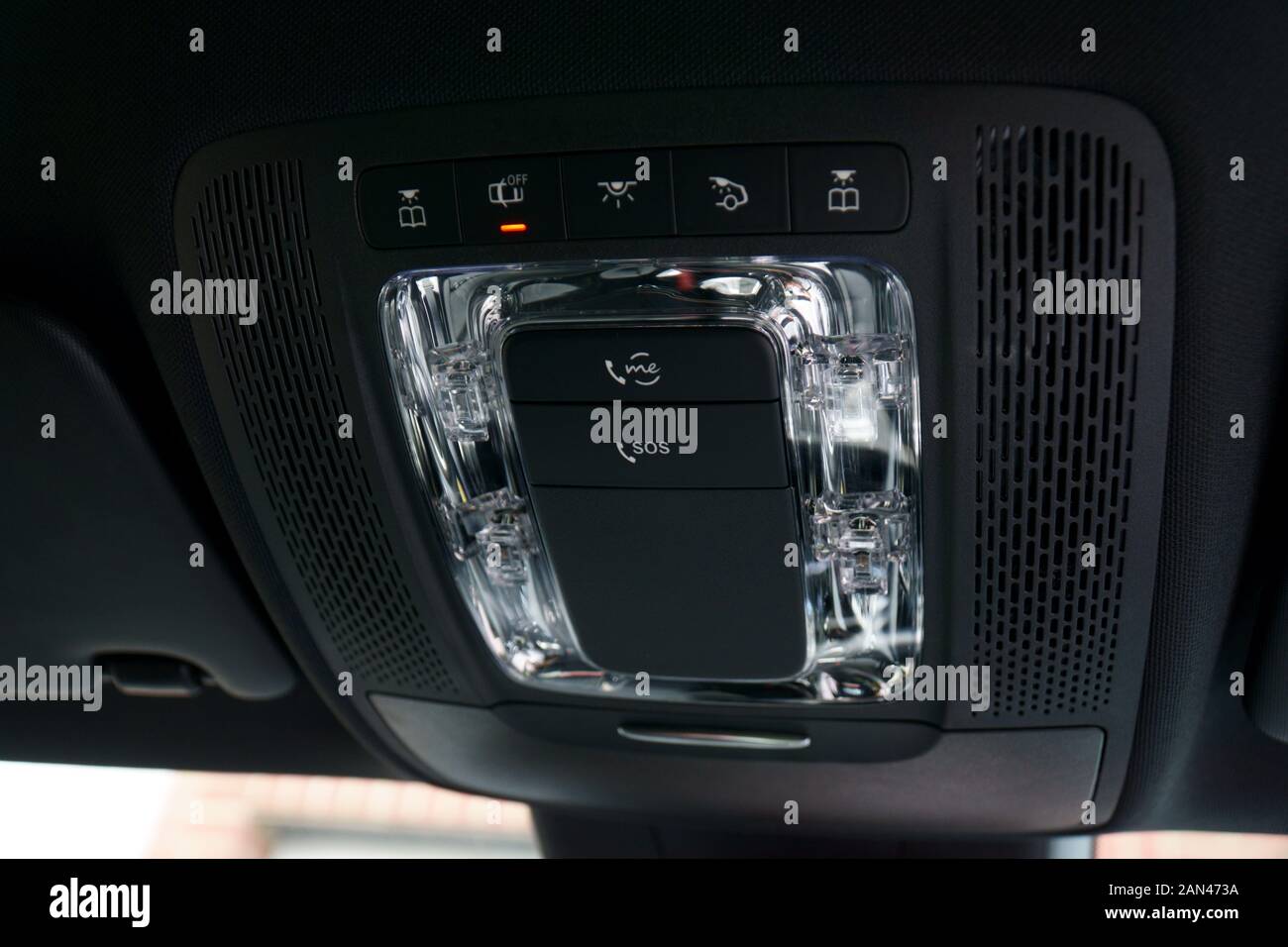 Buttons and dome lights on ceiling of a W177 Mercedes-Benz A-Class car equipped with Mercedes Me Stock Photo