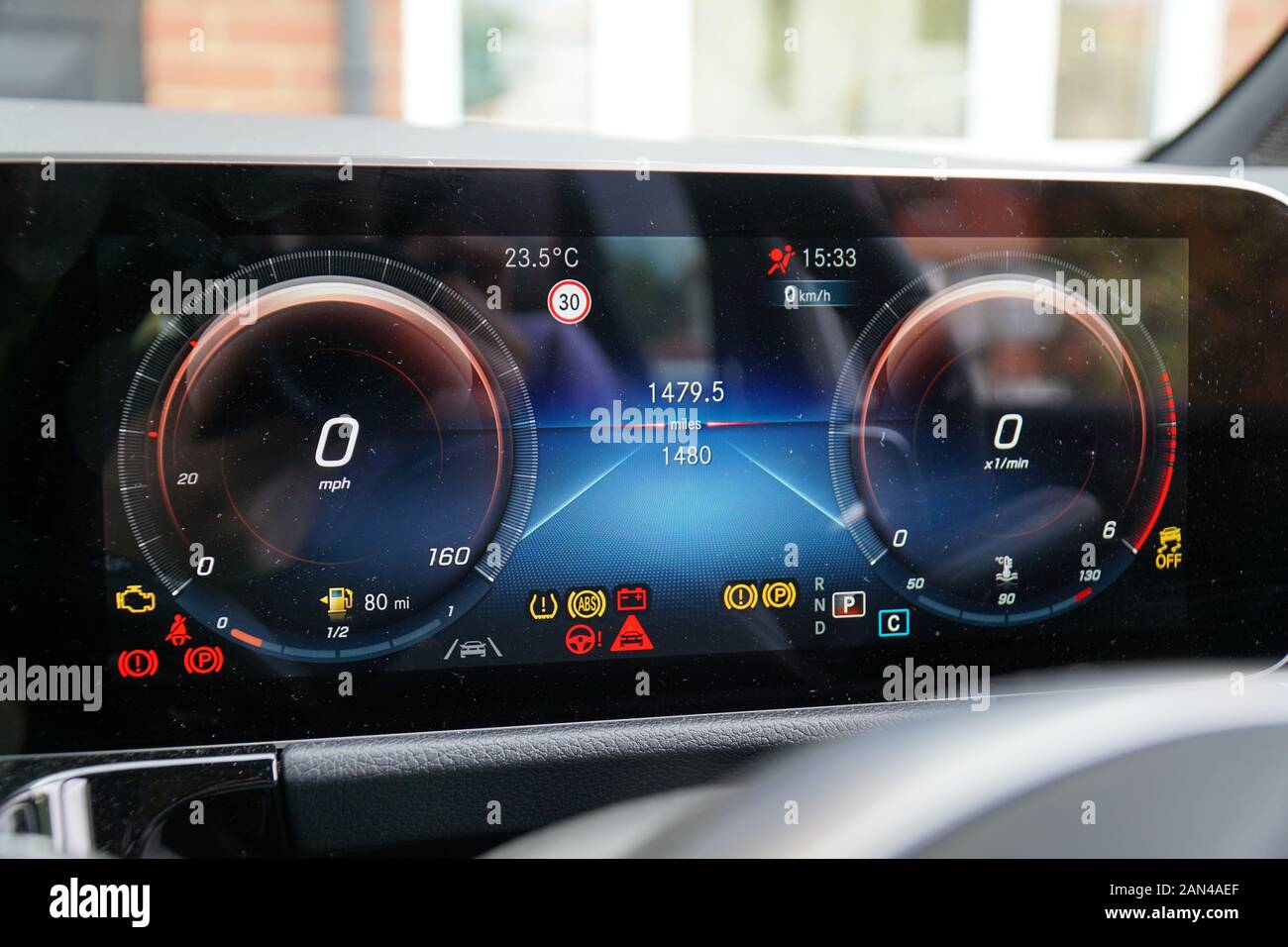 Warning lights on digital driver's display in the interior of a W247 Mercedes-Benz B-Class Stock Photo