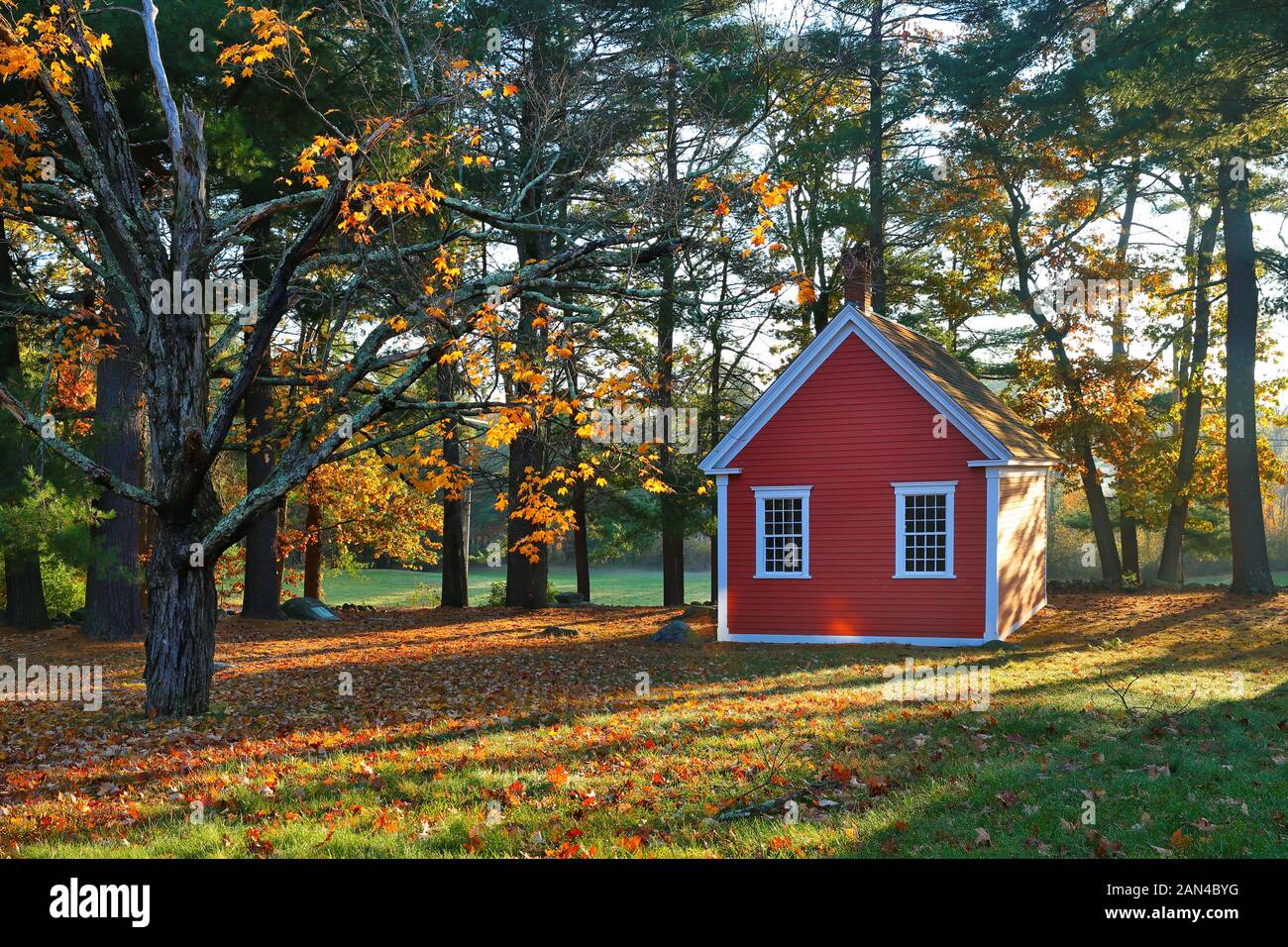 The Redstone School House at sunrise. The school is a classic New England one-room school, dating from 1798, Sudbury MA Stock Photo