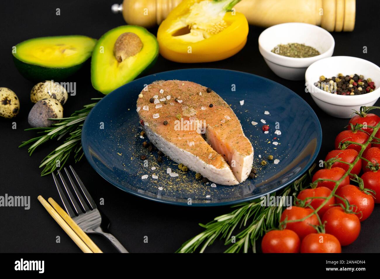 A set of healthy balanced super food, Salmon steak on a beautiful blue ...