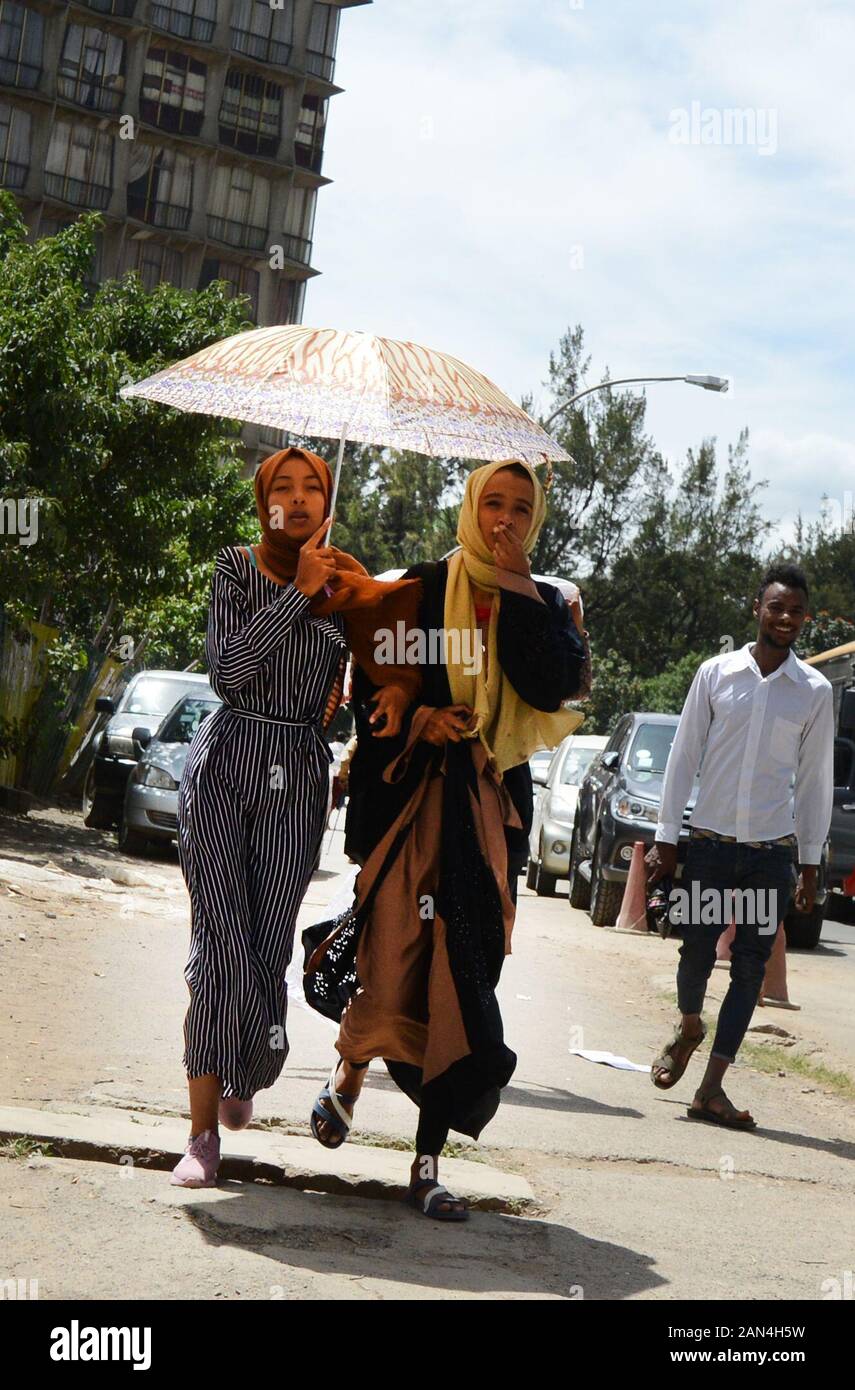 Fashionable Ethiopian woman holding an umbrella. Stock Photo