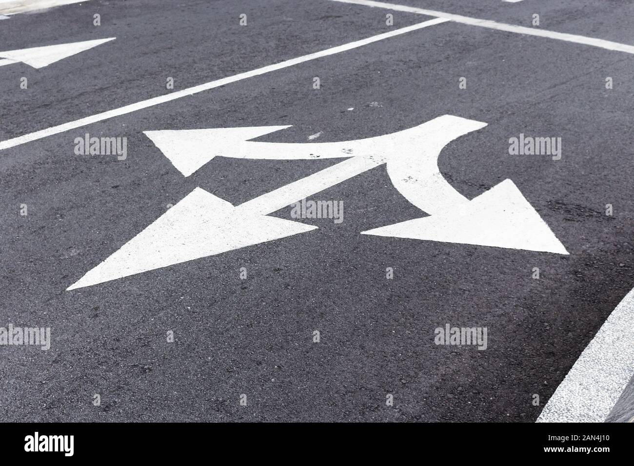 Straight or Turn Left or Right Road Sign on Asphalt. Stock Photo