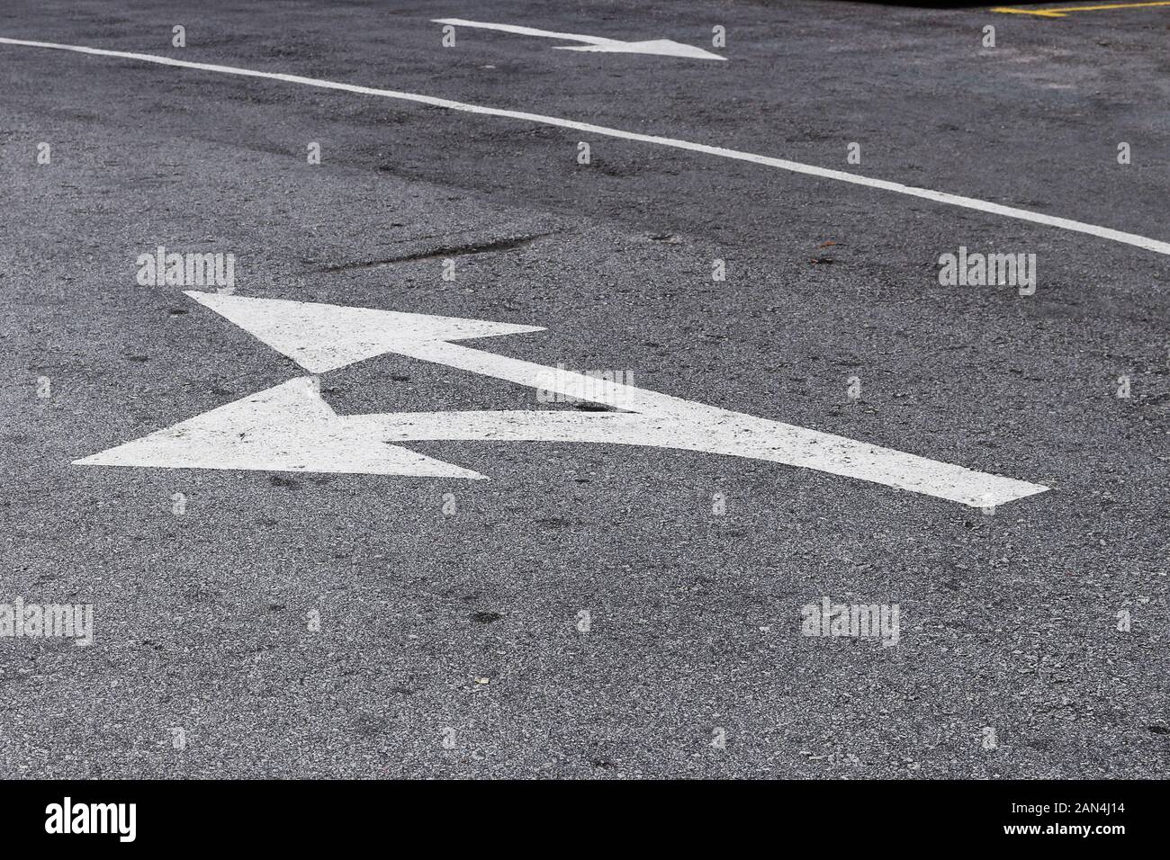 Straight and Turn Left Road Sign Stock Photo