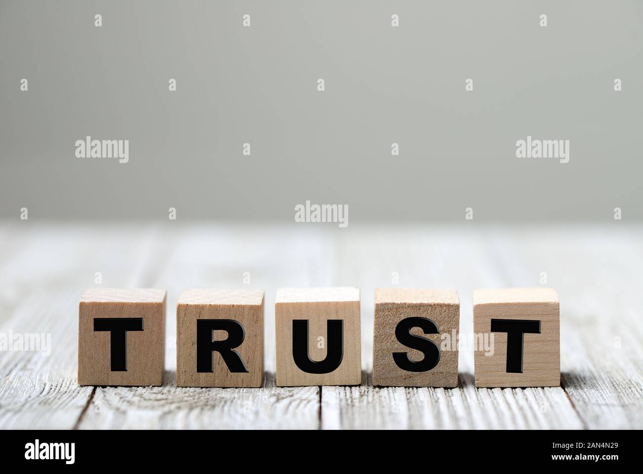 Trust word written on wood block Stock Photo