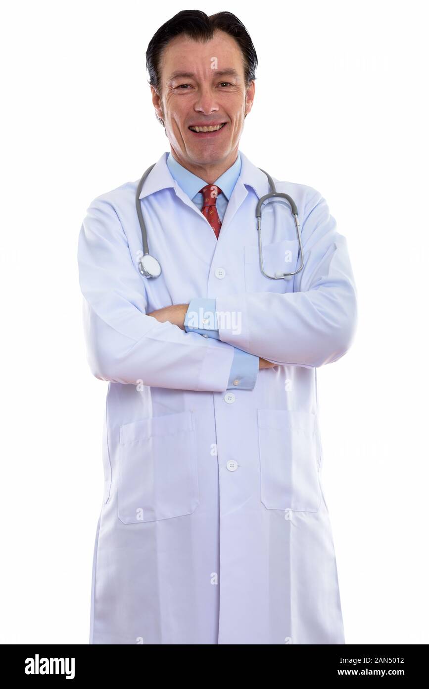 Mature smiling doctor standing hi-res stock photography and images - Alamy