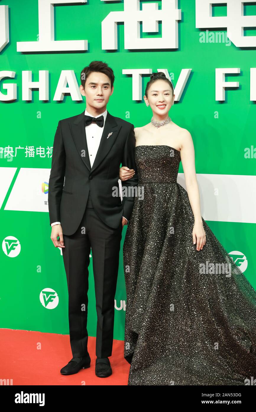 FILE--Chinese actor Wang Kai, left, and --FILE--Chinese actress Tong Yao,  right, show up at the 25th Shanghai TV Festival Magnolia Awards. Shanghai  Stock Photo - Alamy