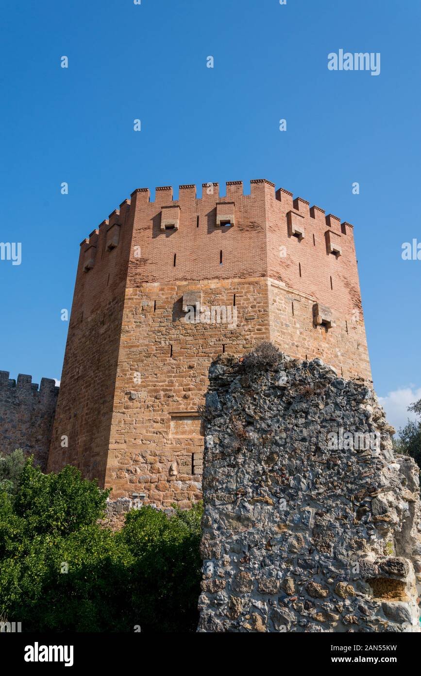 Red tower or Kizil Kule in the ancient citadel Alanya Kalesi Stock Photo