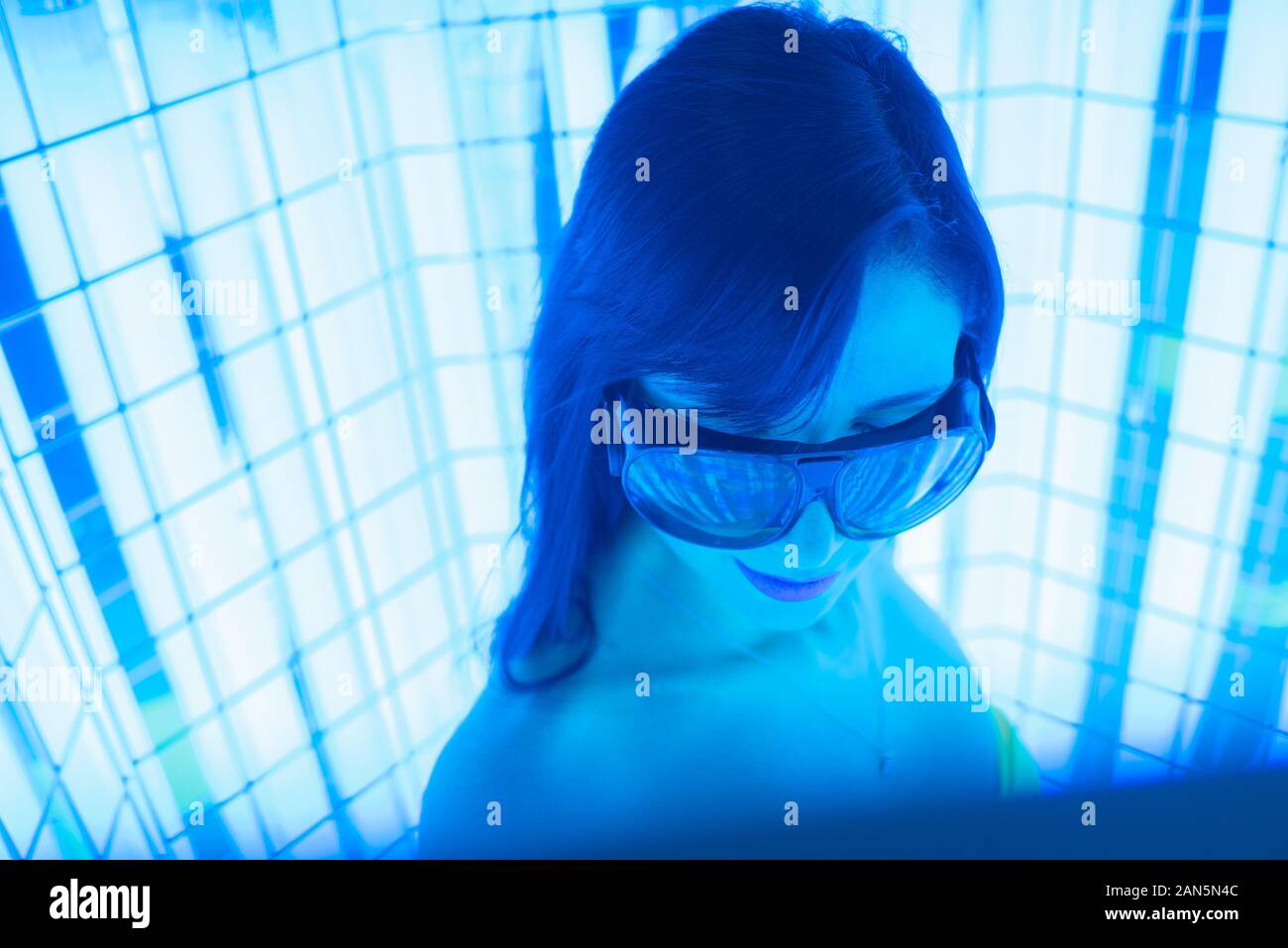 Tanning in the solarium. Phototherapy procedure at a medical