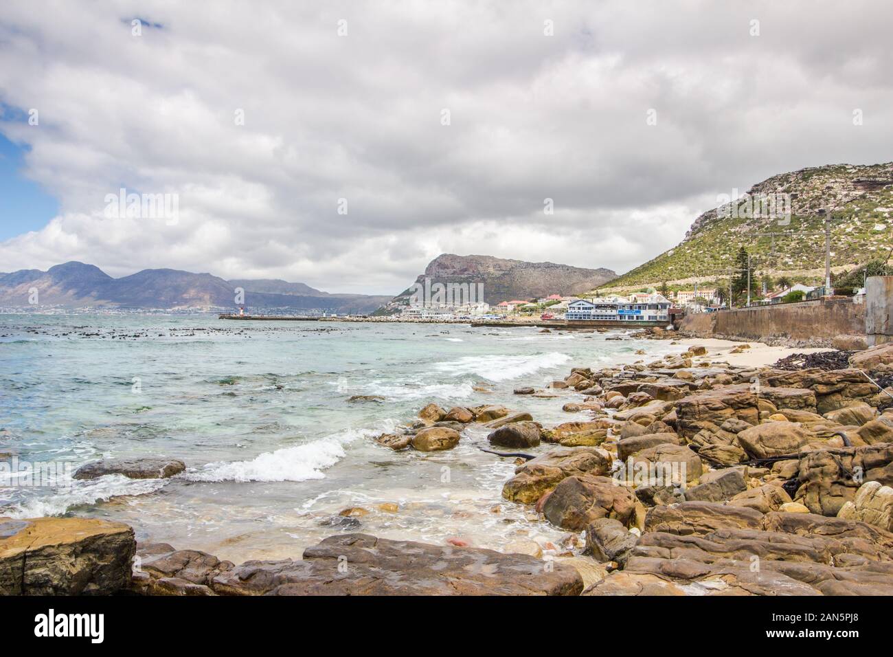 CAPE TOWN , SOUTH AFRICA - 03 JANUARY 2019: View from St James beach over Kalk Bay harbour in |False Bay, Cape Town South Africa Stock Photo