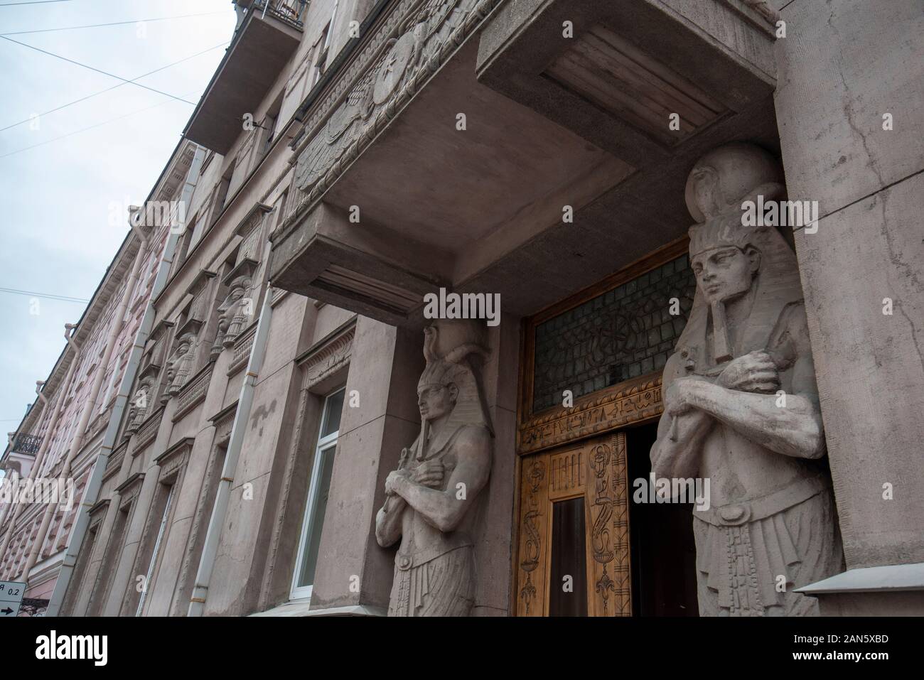 Fragment of a facade of the profitable house of A.I. Nezhinskaya ( Egyptian house ). Former apartment house 23 in Saint Petersburg, Russia Stock Photo
