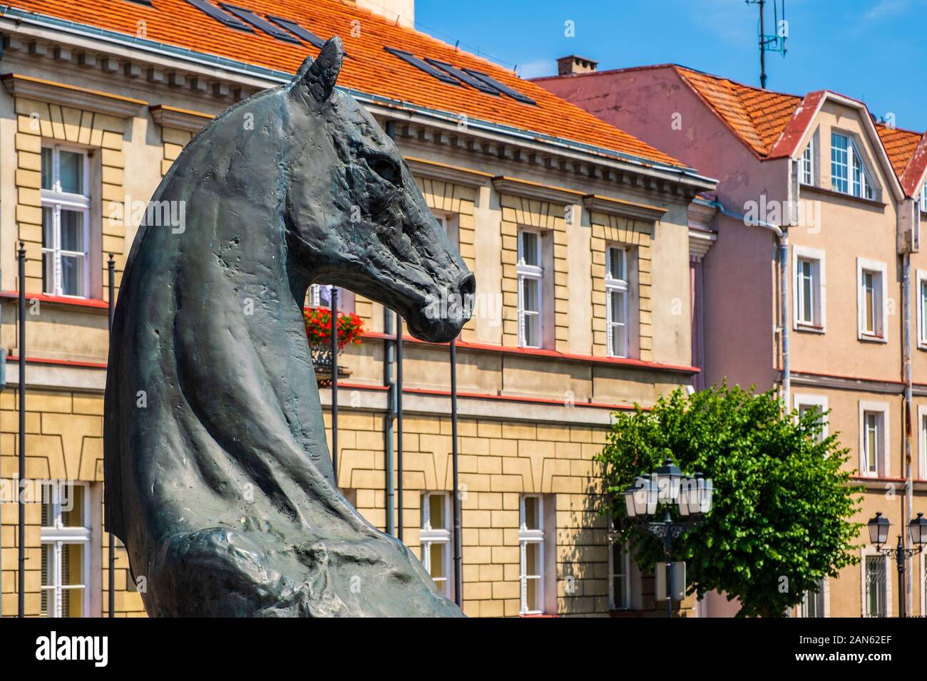 Konin, Greater Poland province / Poland - 2019/06/26: Historic horse statue, symbolic city emblem at the Plac Wolnosci square in the Old Town quarter Stock Photo