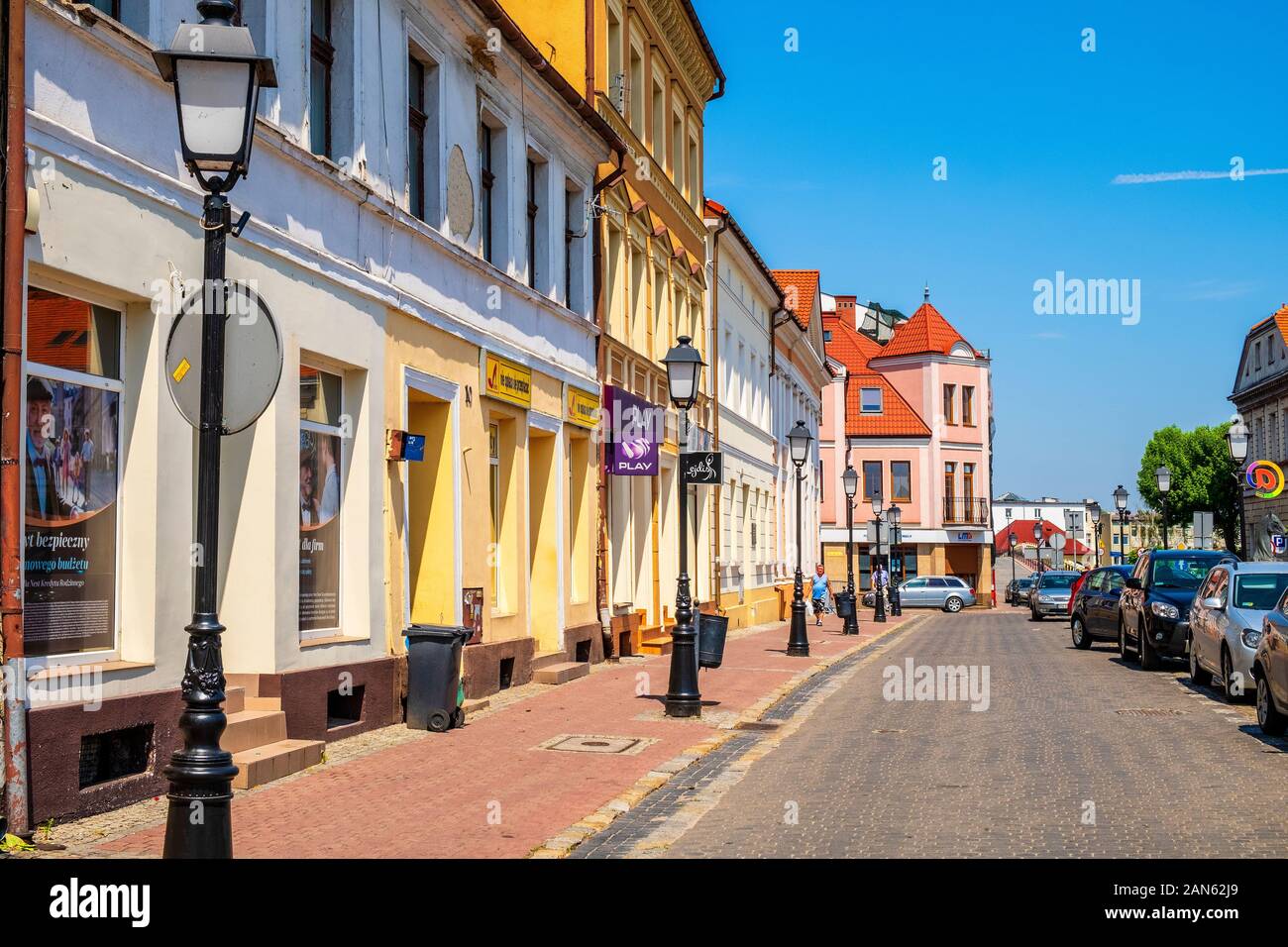 Konin, Greater Poland province / Poland - 2019/06/26: Historic tenements at the market square - Plac Wolnosci square - in Old Town quarter of Konin Stock Photo