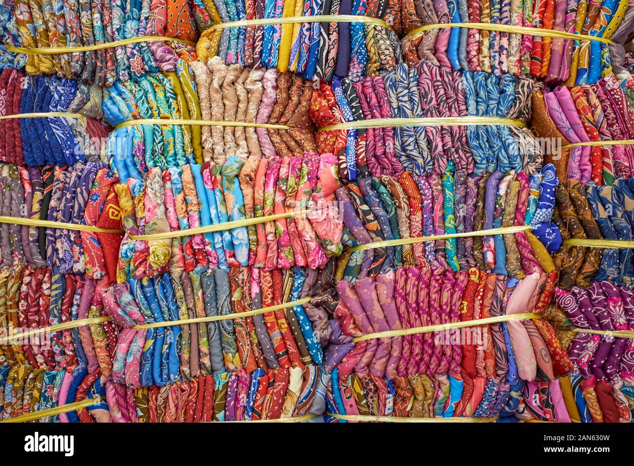 Many bundles of traditional Malay clothing, material, textile, fabric