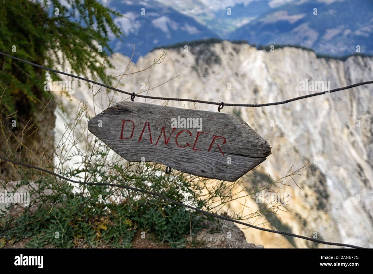 Danger warning at the break-off edge of the Illgraben,  one of the largest erosion aereas in Europe. Chandolin, Val d'Anniviers, Canton of Valais, Eur Stock Photo