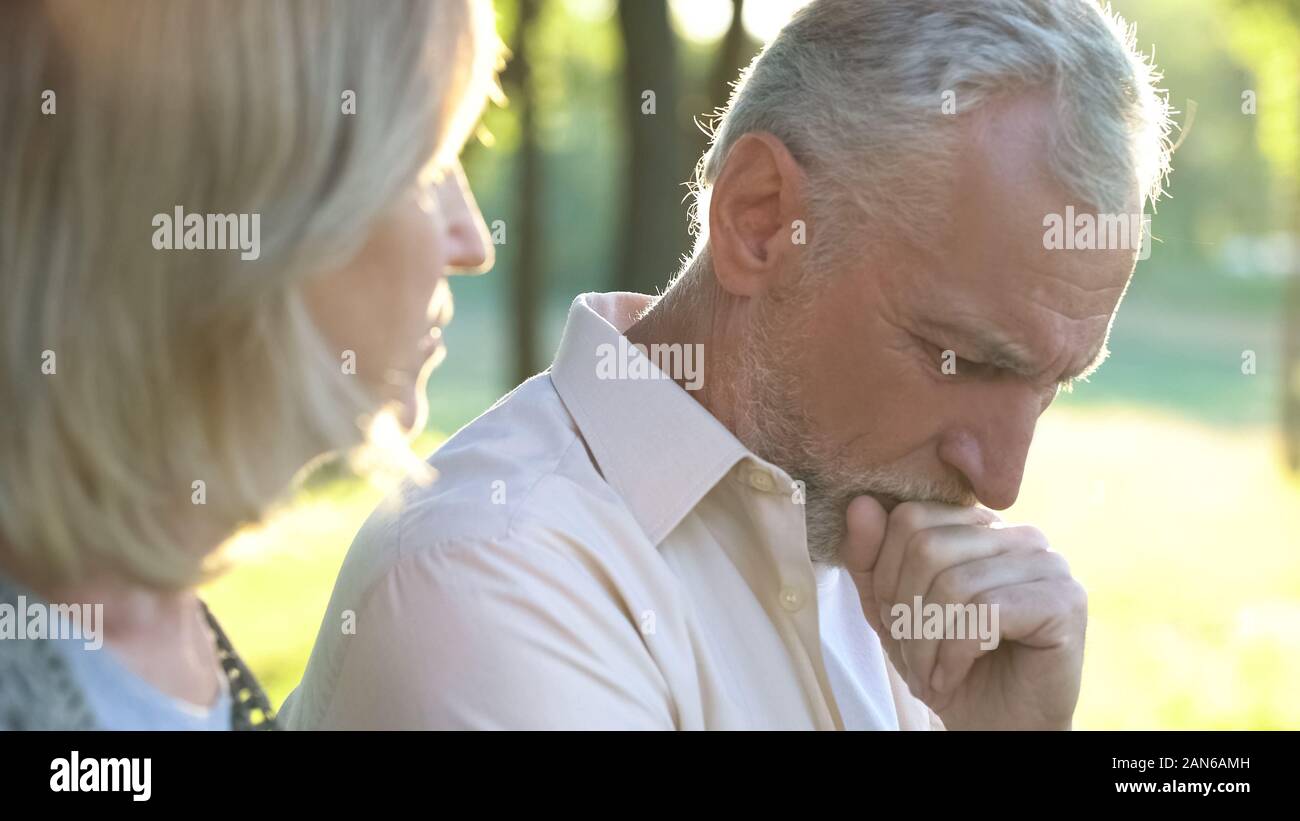Pensive retired man thinking over life difficulties, hard life of pensioners Stock Photo