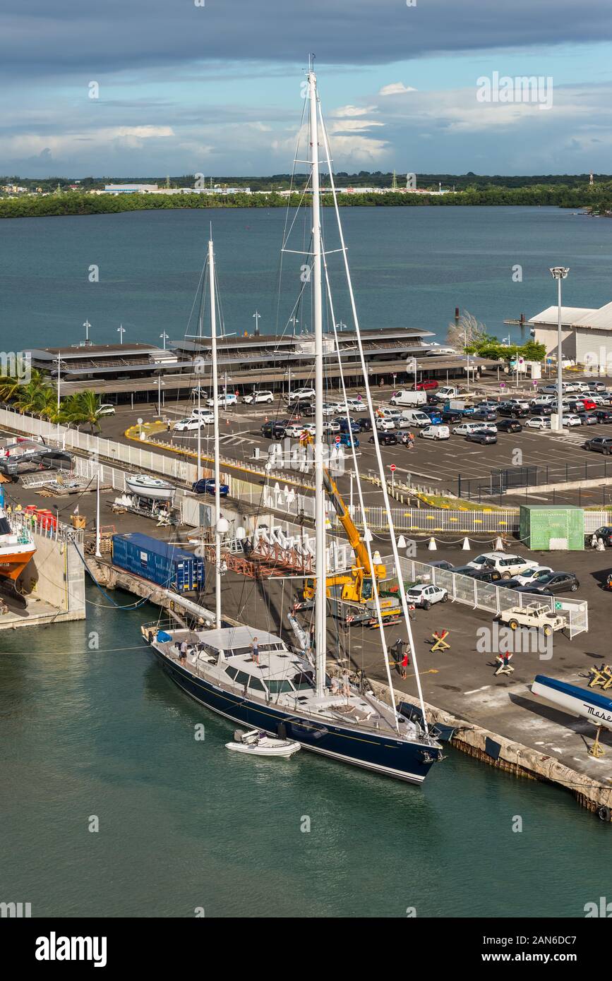 Pointe-a-Pitre, Guadeloupe - December 14, 2018: Luxury sailing yacht moored in port of Pointe-a-Pitre, Guadeloupe, an overseas region of France, Lesse Stock Photo