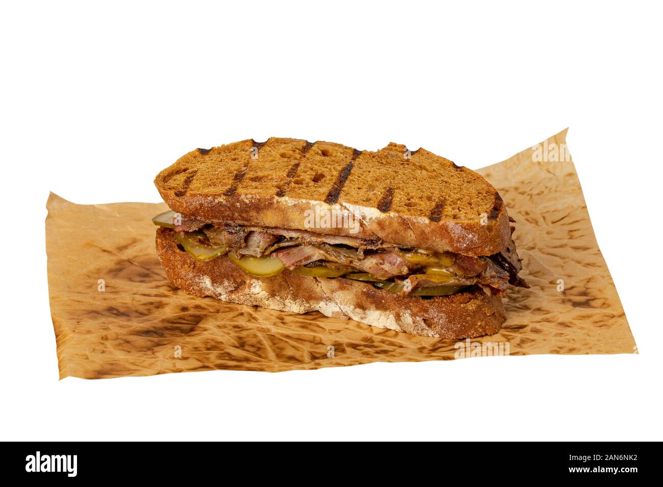 Sandwich of savory ground beef with salted cucumbers on toasted