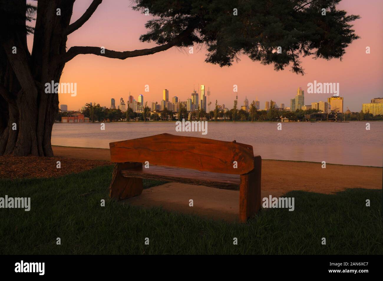 A view of Melbourne at sunrise looking across Albert Park lake. Stock Photo