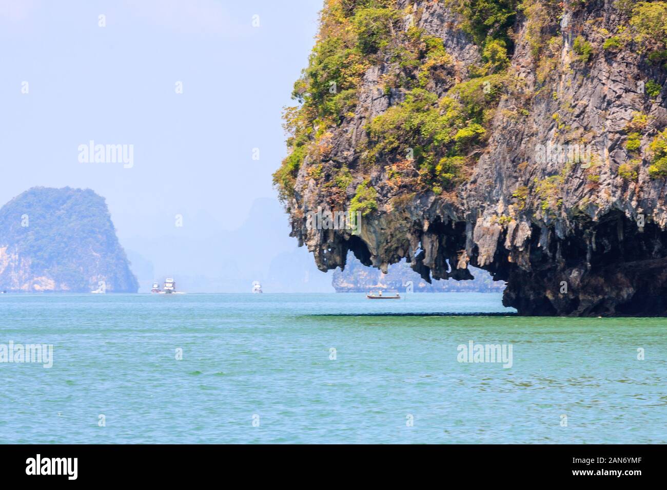 Limestone cliff and stalactites in Phang Nga Bay, Phuket, Thailand Stock Photo