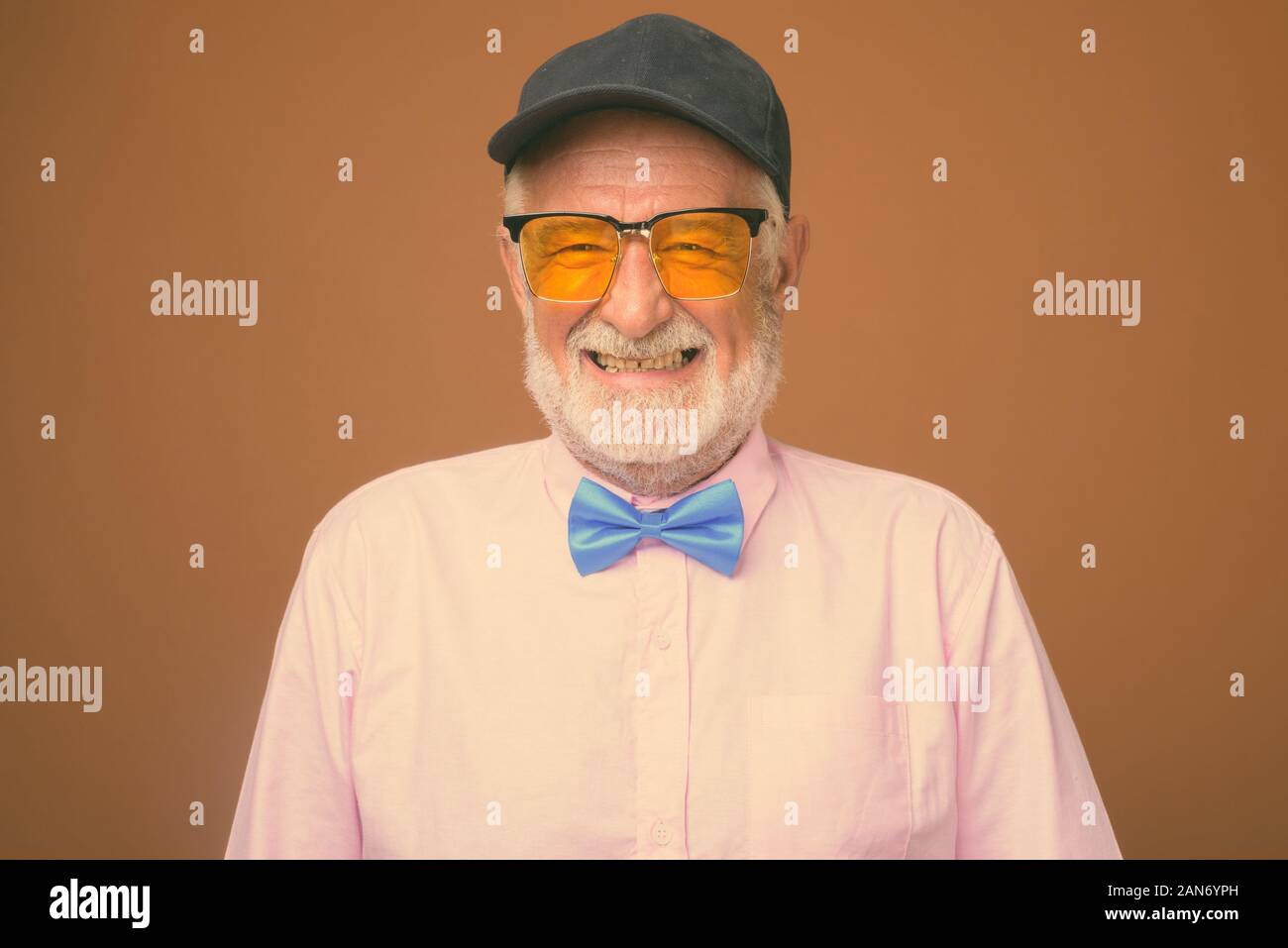 Happy senior man wearing cap hi-res stock photography and images - Alamy
