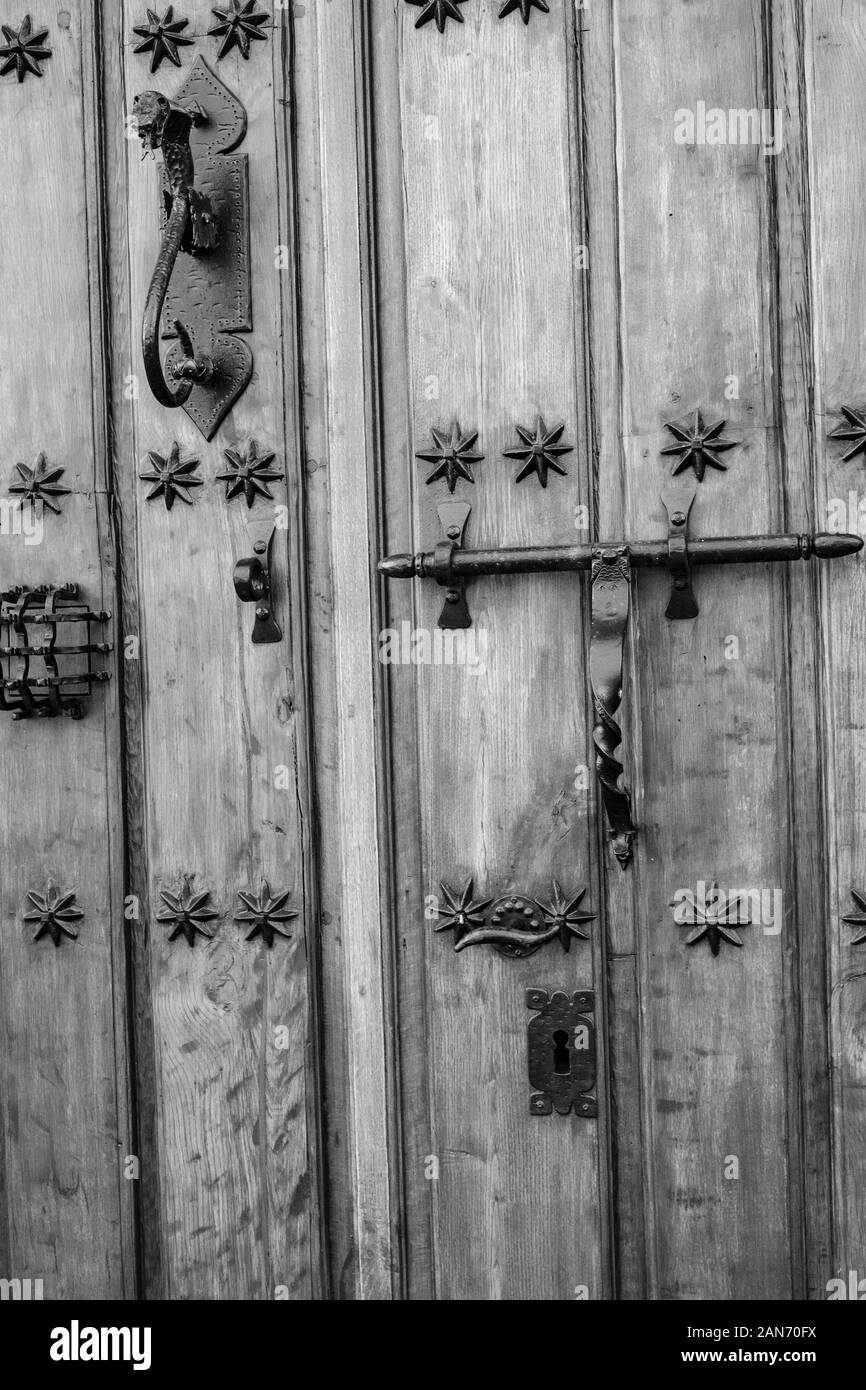 Old fashioned wooden door in white in black Stock Photo Alamy
