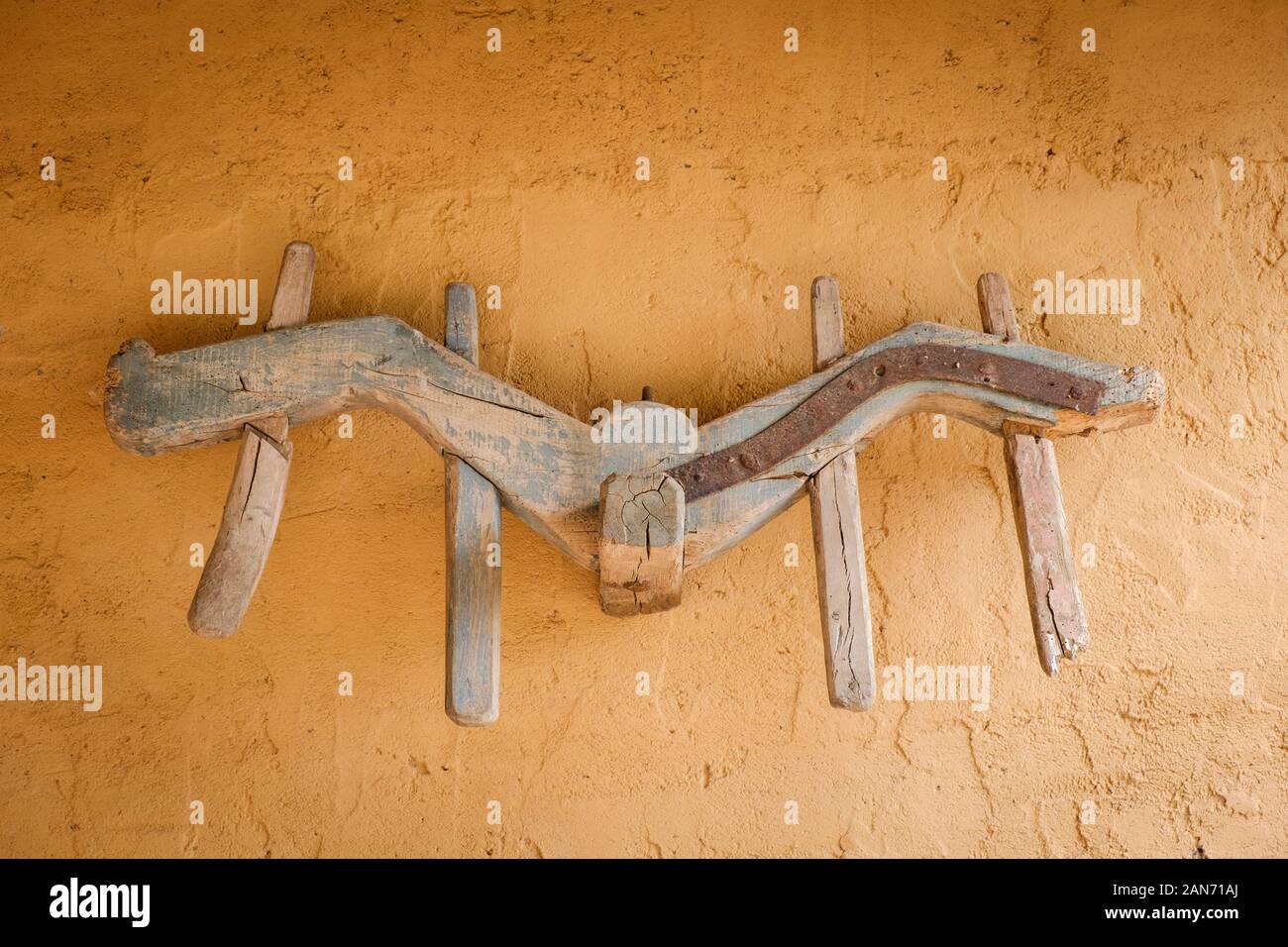 Old wooden yoke hanging on the wall as an ornament Stock Photo Alamy