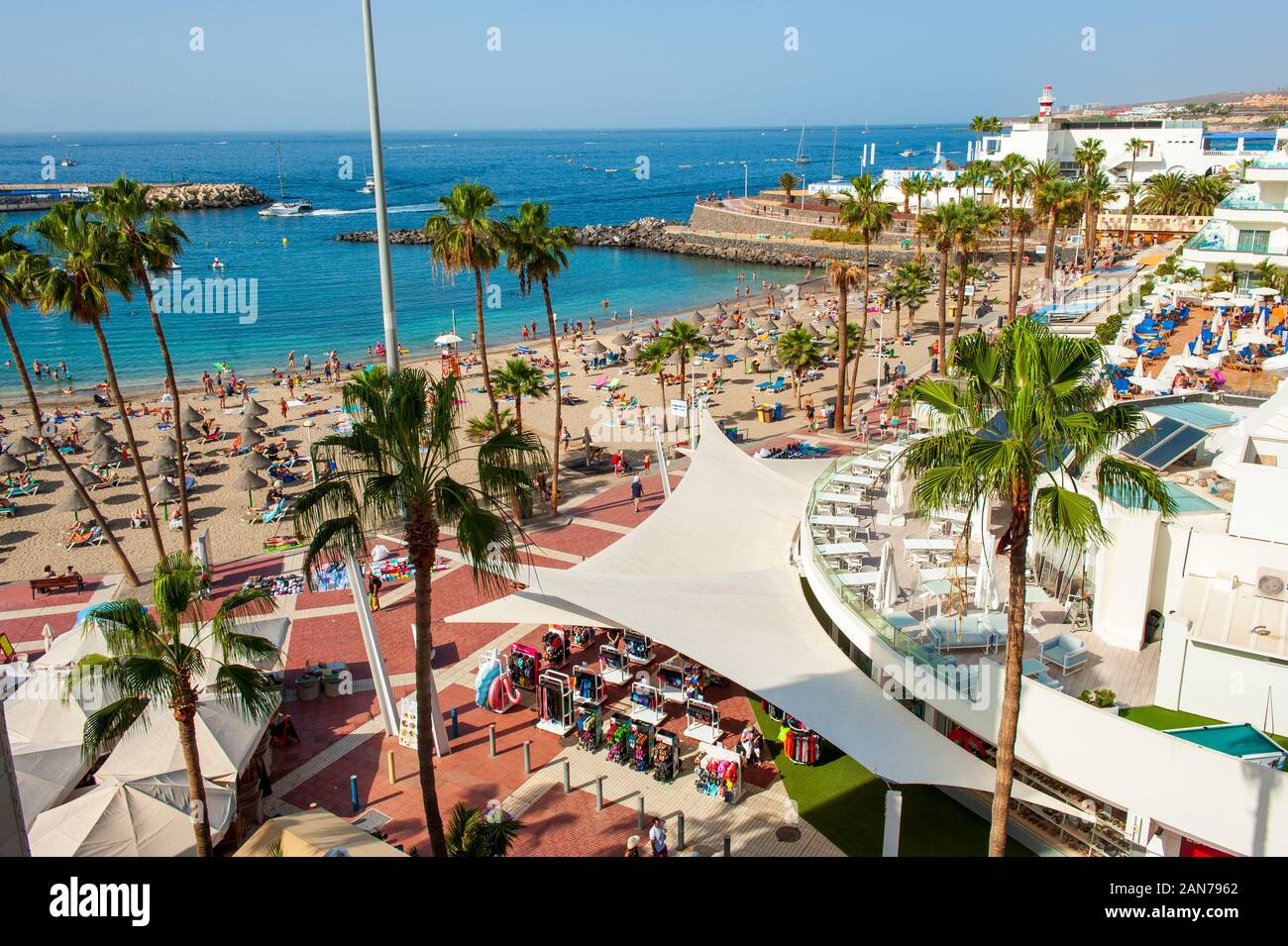 CANARY ISLAND TENERIFE, SPAIN - 26 DEC, 2019: The boulevard with terraces near the beach called playa la pinta puerto colon. A very popular beach near Stock Photo