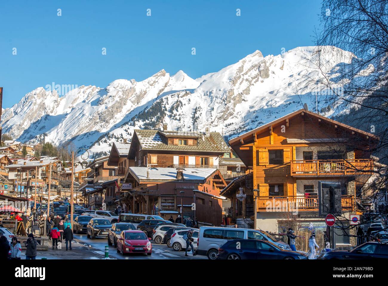 La Clusaz ski resort and sunny snow covered mountains in the Haute-Savoie department in the Auvergne-Rhône-Alpes region in south-eastern France Stock Photo