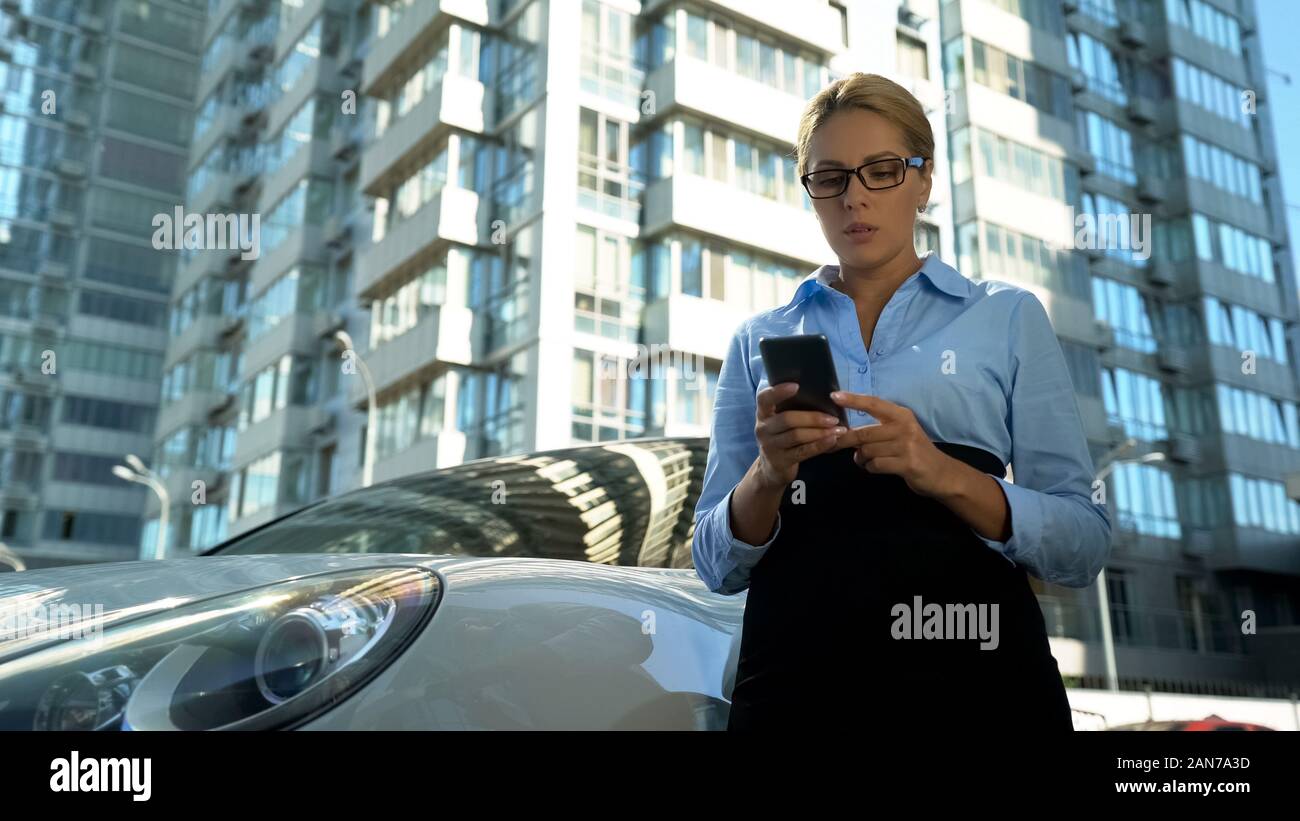 Worried business lady reading message with bad news from work, failed startup Stock Photo
