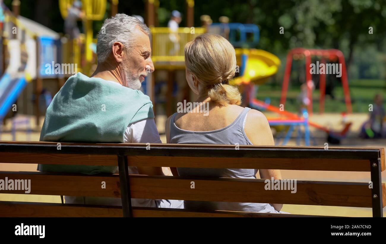 Man bench sitting park kids hi-res stock photography and images - Alamy