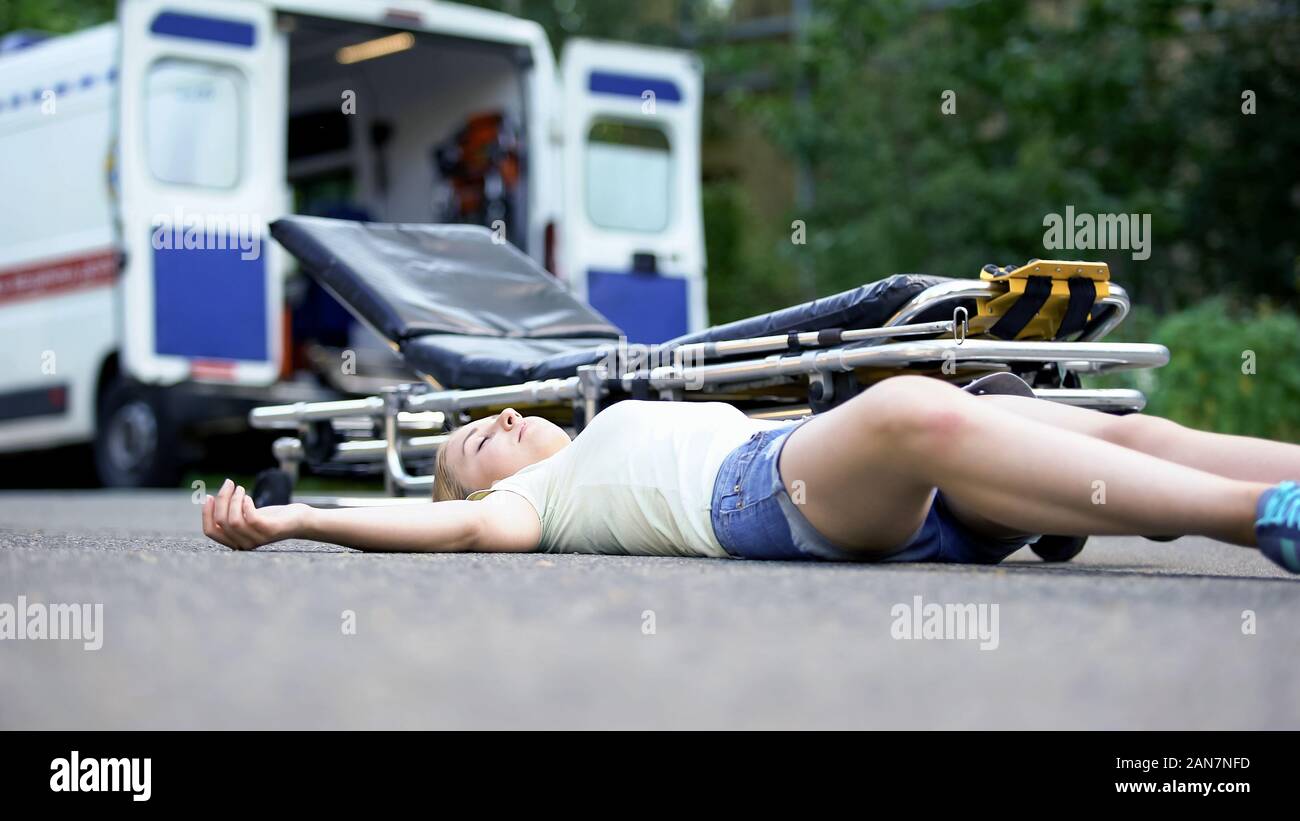 Beautiful Young Unconscious Knocked Out Woman Stock Photo