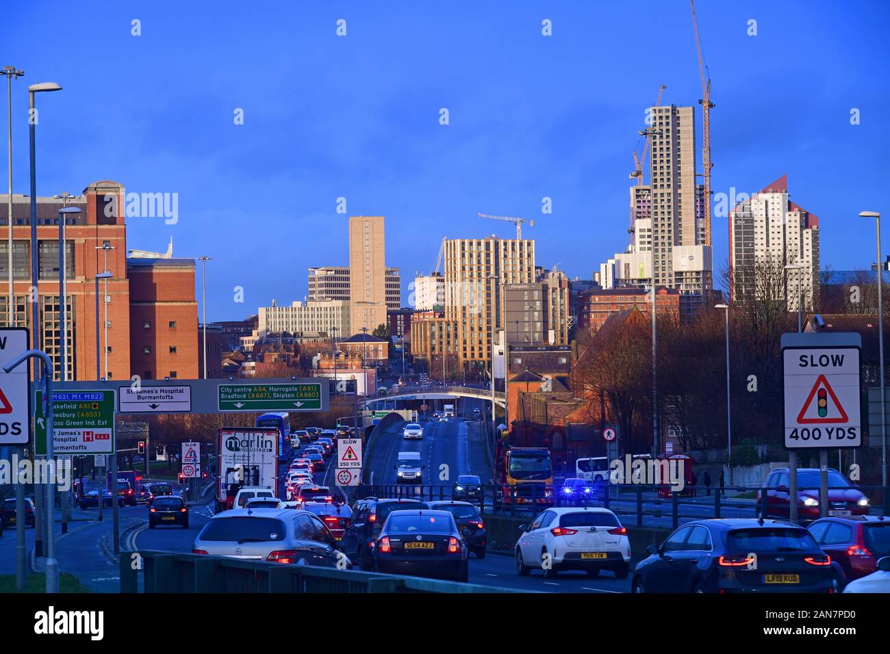 traffic jam heading into the city of Leeds at sunrise yorkshire united kingdom Stock Photo