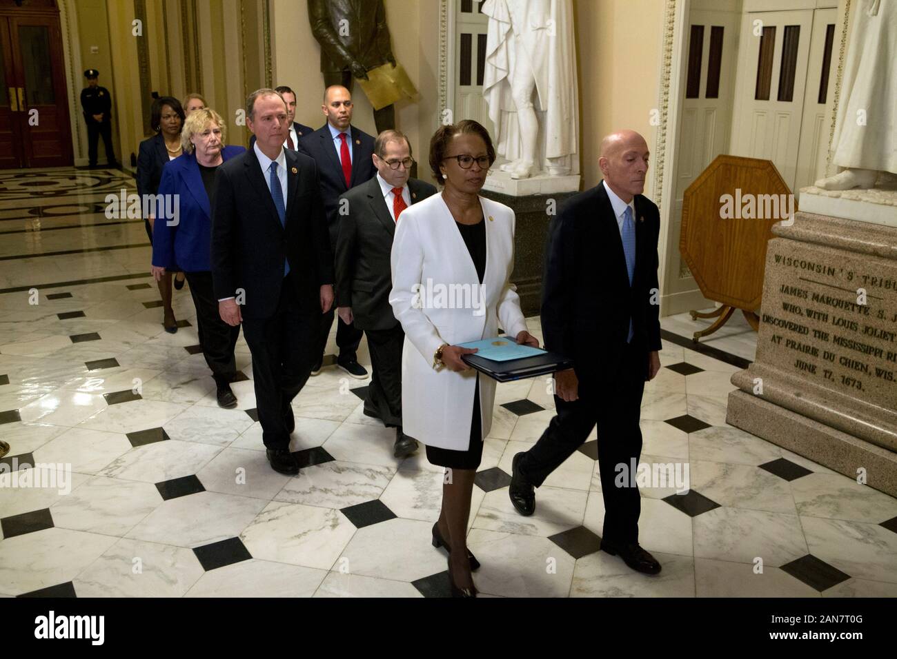 United States House Sergeant at Arms Paul Irving and Clerk of the US House Cheryl Johnson deliver the articles of impeachment against US President Donald J. Trump to the Secretary of the US Senate Julie Adams on Capitol Hill in Washington, DC, Wednesday, January 15, 2020. Following are impeachment managers, US Representative Jerrold Nadler (Democrat of New York), Chairman, US House Judiciary Committee; US Representative Adam Schiff (Democrat of California), Chairman, US House Permanent Select Committee on Intelligence; US Representative Hakeem Jeffries (Democrat of New York); US Representative Stock Photo