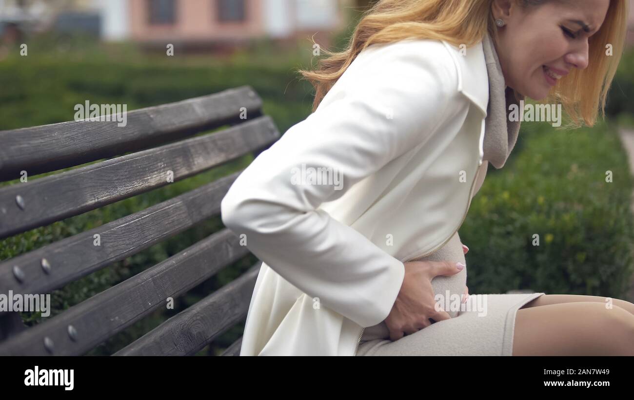 Expecting Woman Suffering From Sudden Sharp Pain In Belly Miscarriage expecting-woman-suffering-from-sudden-sharp-pain-in-belly-miscarriage