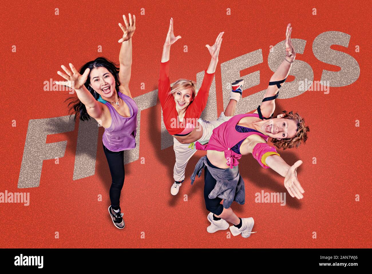 female fitness instructors in sport dress at an aerobic or zumba exercise Stock Photo