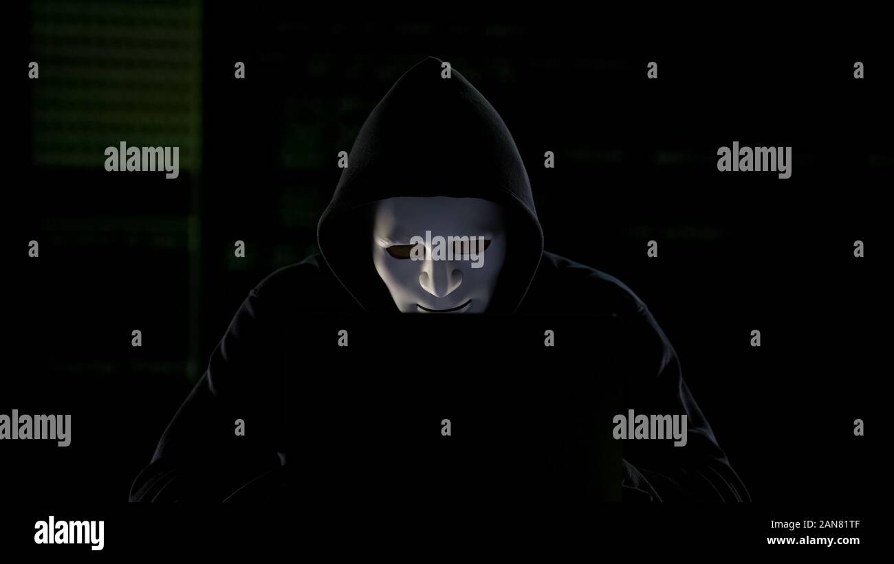 Hacker in mask hi-res stock photography and images - Alamy