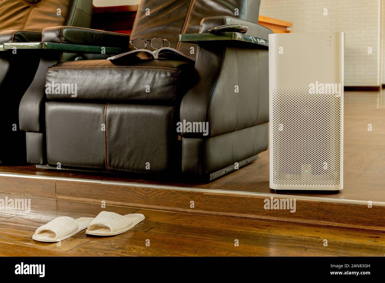 Electric Air Purifier In A Living Room For Cleaning Fine Dust In House Stock Photo Alamy