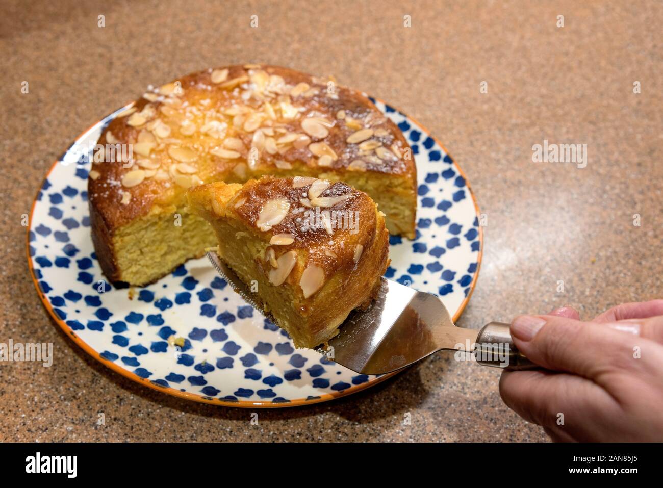 Orange and almond cake slice.Home baking. Stock Photo