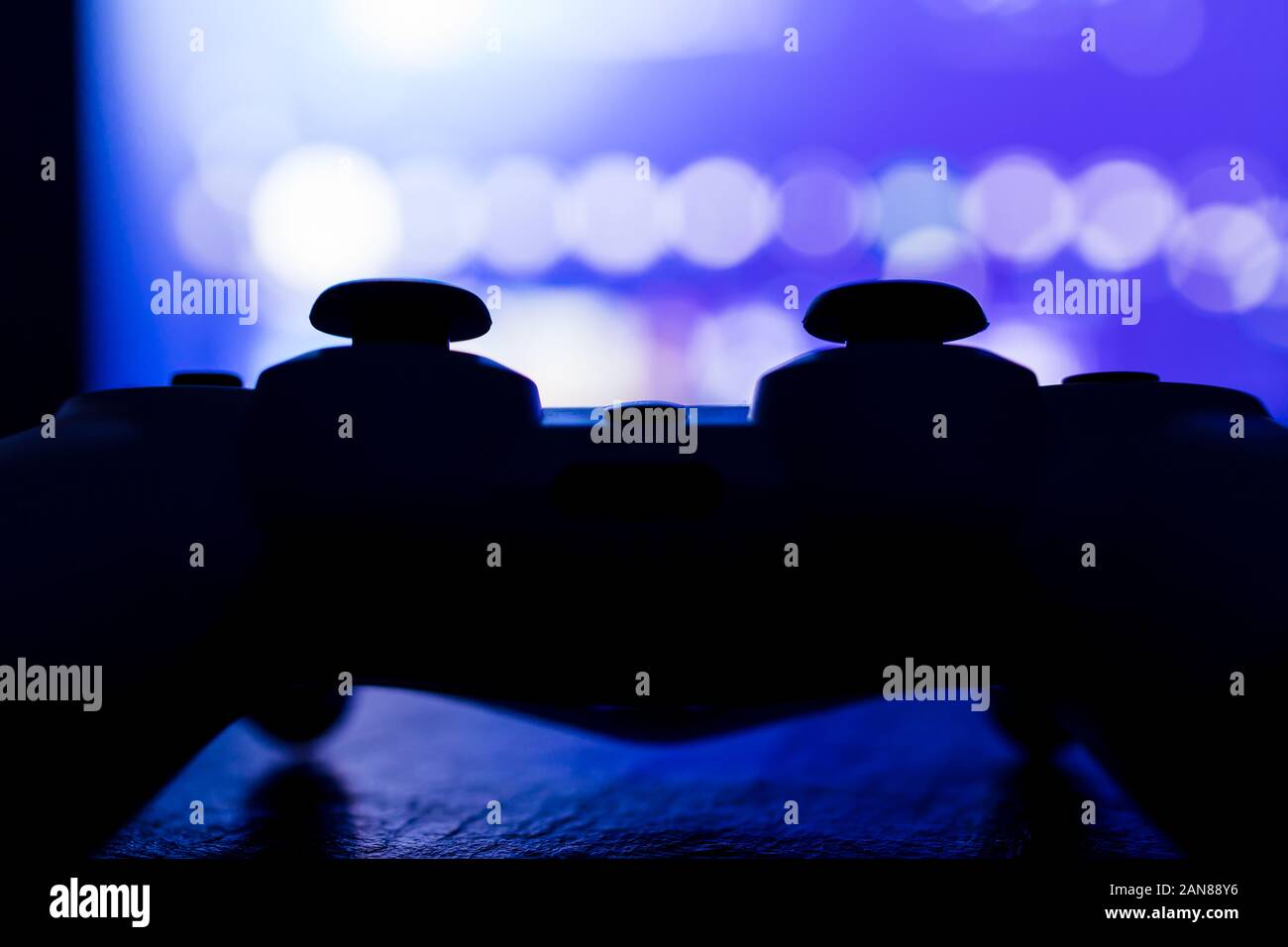 Video game gaming controller night with lights TV television screen