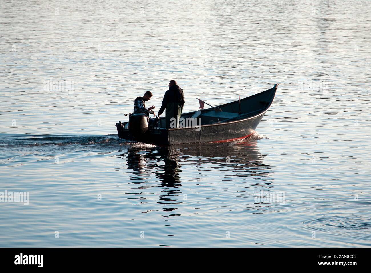 Boat calm water hi-res stock photography and images - Alamy