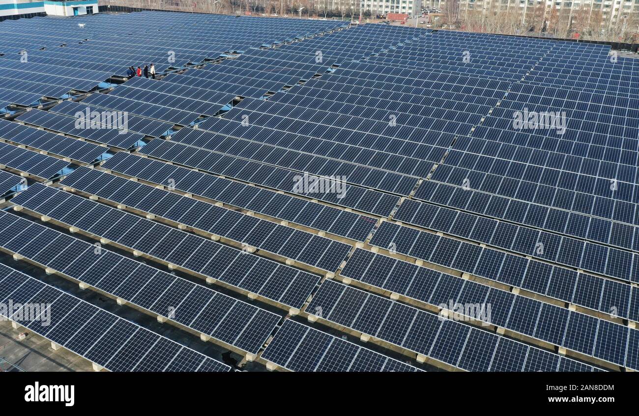 Solar panels in a city rooftop hi-res stock photography and images - Alamy