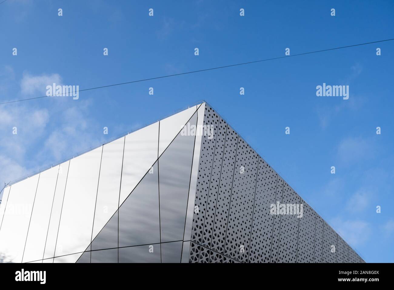 Architecture Detail Of A Modern Building With A Blue Sky On Background 
